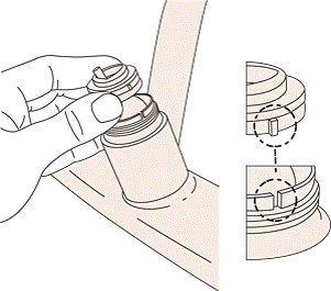 Partially unscrew the adjusting ring